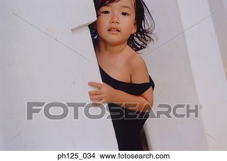Picture - Portrait of a young Asian girl, close-up. Fotosearch