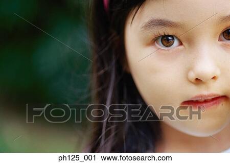 Portrait of a young girl, close-up View Large Photo Image Stock Image - Portrait of a young girl, close-up. Fotosearch
