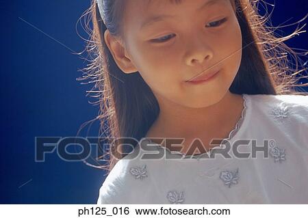 Stock Photograph - Portrait of a young girl, close-up. Fotosearch