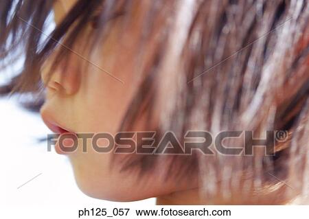 Side profile of a young girl, close-up View Large Photo Image Stock Photo - Side profile of a young girl, close-up. Fotosearch