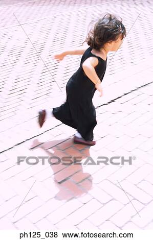 Stock Photo - Young Asian girl running. Fotosearch