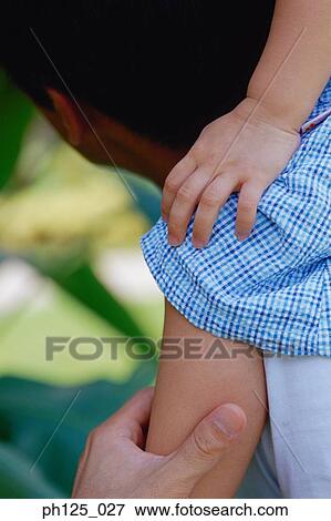 Young girl on father's shoulder View Large Photo Image Stock Photo - Young girl on father's shoulder. Fotosearch