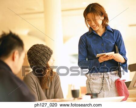 Waitress taking orders for customers View Large Photo Image Stock Image - Waitress taking orders for customers. Fotosearch