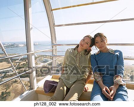 Stock Image - Portrait of two young women. Fotosearch
