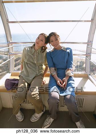 Stock Photograph - Portrait of two young women. Fotosearch