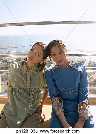 Stock Photography - Portrait of two young women. Fotosearch
