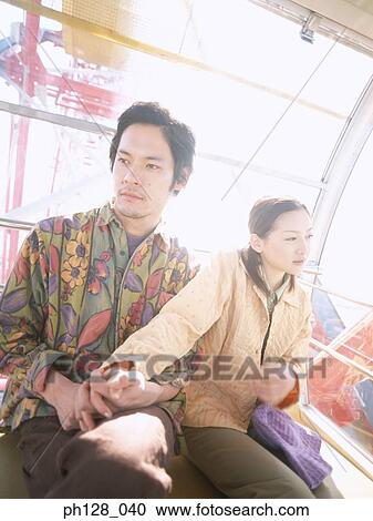 Portrait of Young couple holding hands View Large Photo Image Stock Image - Portrait of Young couple holding hands. Fotosearch