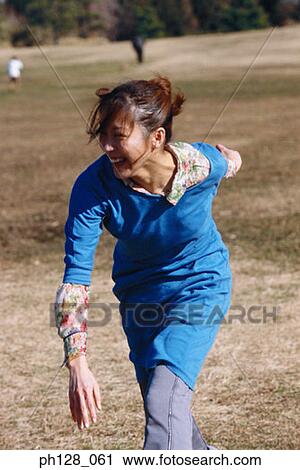 Young woman laughing View Large Photo Image Stock Image - Young woman laughing. Fotosearch