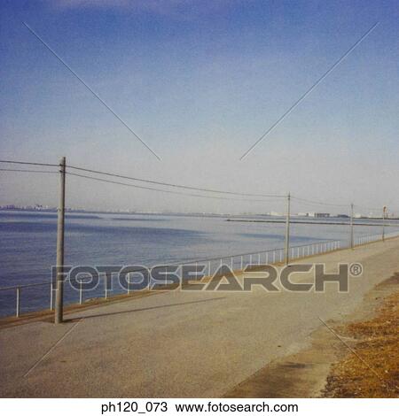 Empty pathway by the sea View Large Photo Image Stock Image - Empty pathway by the sea. Fotosearch