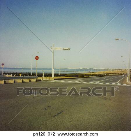 Empty road and street lamps View Large Photo Image Stock Image - Empty road and street lamps. Fotosearch
