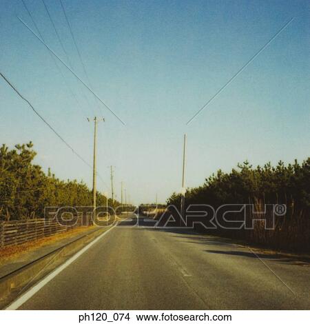 Empty road with pylons View Large Photo Image Picture - Empty road with pylons. Fotosearch