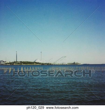 Industrial estate across the sea View Large Photo Image Stock Photo - Industrial estate across the sea. Fotosearch