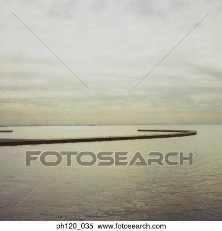 Jetty at sunset View Large Photo Image Stock Photography - Jetty at sunset. Fotosearch