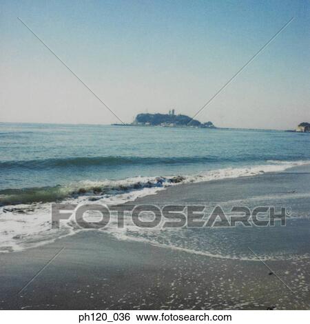 Wave rushing on to Shore View Large Photo Image Stock Photograph - Wave rushing on to Shore . Fotosearch