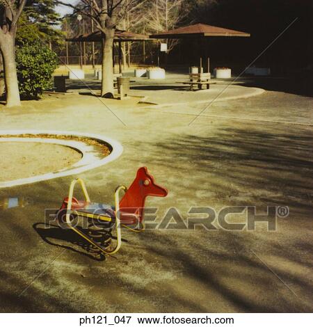 Stock Photo - A animal rocker in children's playground. Fotosearch