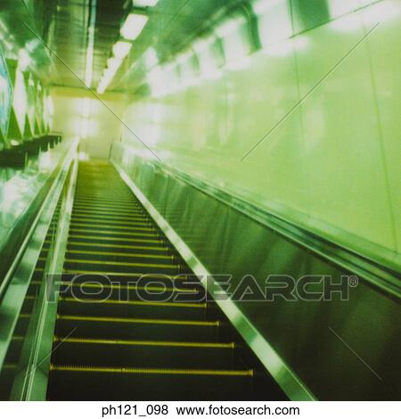 Stock Photo - Ascending escalator. Fotosearch