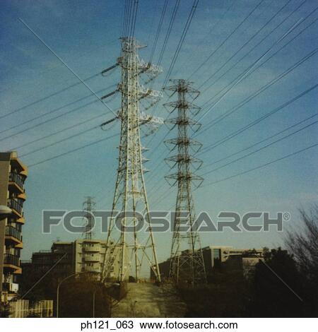 Electrical pylons and power lines in suburban estate View Large Photo Image Stock Image - Electrical pylons and power lines in suburban estate. Fotosearch