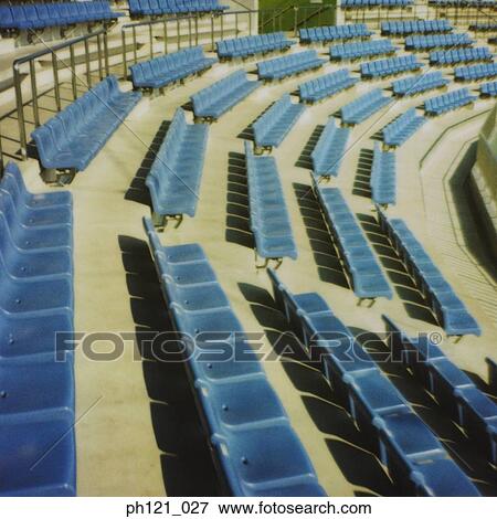 Stock Photo - Empty seats in sports stadium. Fotosearch
