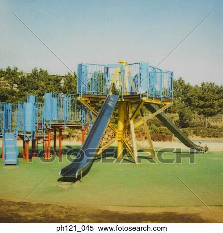 Stock Photography - Empty slides in playground. Fotosearch