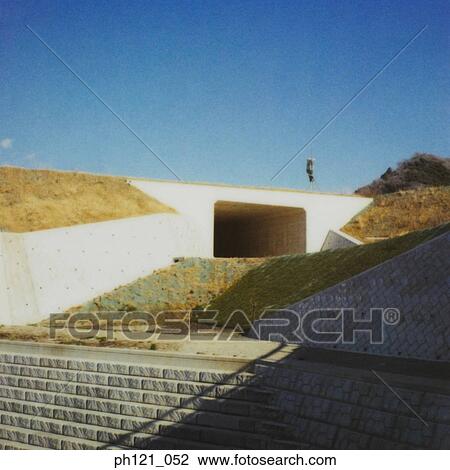 Entrance/exit of an underground pedestrian tunnel View Large Photo Image Stock Image - Entrance/exit of an underground pedestrian tunnel. Fotosearch