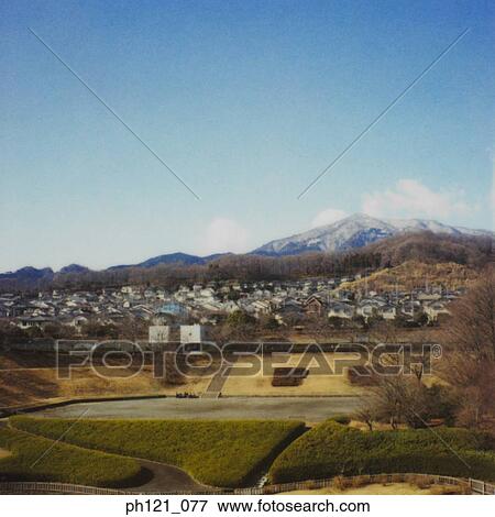 Park and estates, snow capped mountain in background View Large Photo Image Stock Photo - Park and estates, snow capped mountain in background. Fotosearch