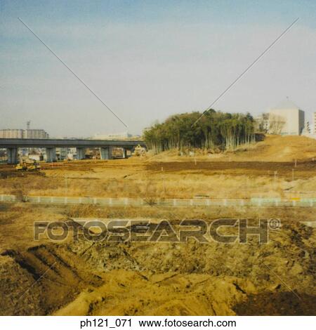 Piece of land under construction View Large Photo Image Stock Image - Piece of land under construction. Fotosearch