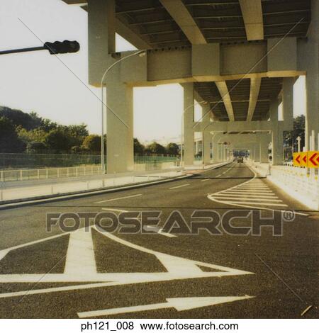 Road markings on road below highway View Large Photo Image Stock Photo - Road markings on road below highway. Fotosearch