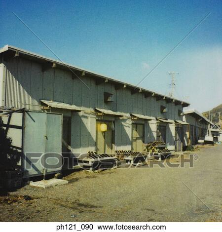 Stock Image - Row of shop houses. Fotosearch