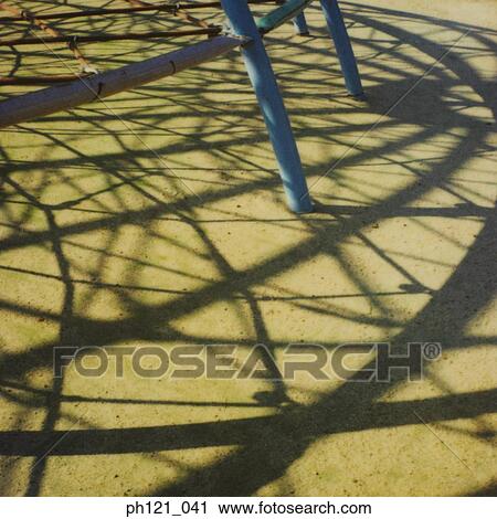 Shadow of a rounded fixture on ground View Large Photo Image Stock Image - Shadow of a rounded fixture on ground. Fotosearch