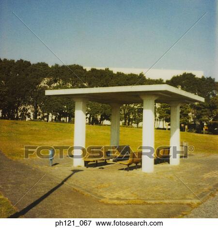 Stock Photo - Shelter with benches in the park. Fotosearch