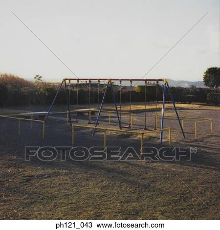 Stock Image - Swings in playground. Fotosearch