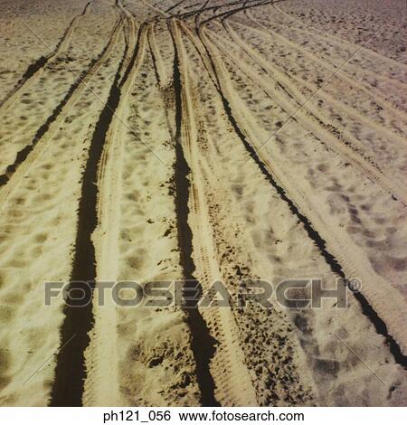 Tracks on sand View Large Photo Image Stock Photograph - Tracks on sand. Fotosearch