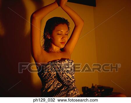 Woman in balancing yoga position View Large Photo Image Stock Image - Woman in balancing yoga position . Fotosearch