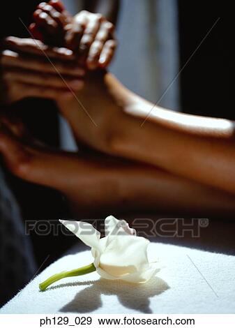 Woman receiving a foot massage View Large Photo Image Stock Photo - Woman receiving a foot massage. Fotosearch