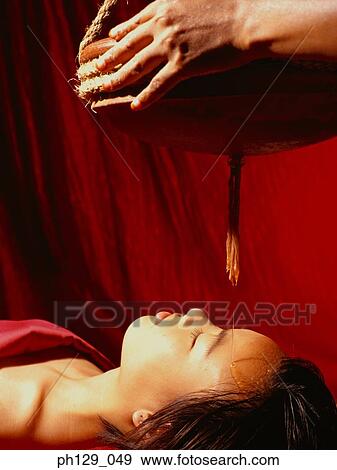 Stock Photo - Woman receiving spa therapy. Fotosearch