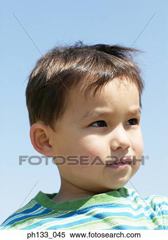 Young boy looking ahead View Large Photo Image Stock Photography - Young boy looking ahead. Fotosearch