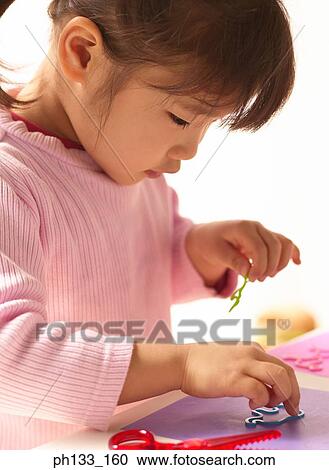 Young girl doing craft work View Large Photo Image Stock Image - Young girl doing craft work. Fotosearch