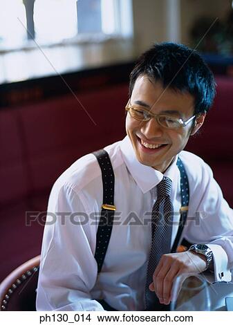 Picture - Asian Man laughing. Fotosearch