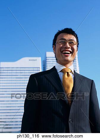 Asian Man laughing View Large Photo Image Stock Photograph - Asian Man laughing. Fotosearch