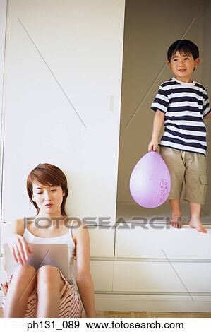 Stock Photo - Asian mother and son together. Fotosearch