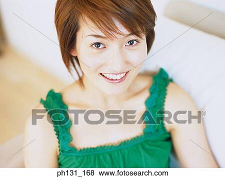 Close up of a Asian woman's face View Large Photo Image Stock Photo - Close up of a Asian woman's face. Fotosearch
