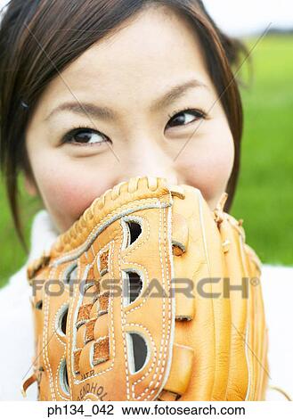 Young woman with baseball mitt View Large Photo Image Stock Image - Young woman with baseball mitt. Fotosearch