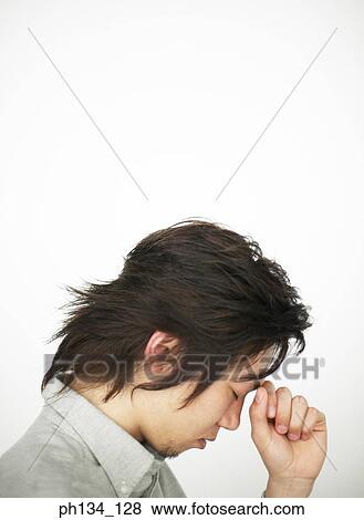 Young man in depressed mood View Large Photo Image Stock Photo - Young man in depressed mood. Fotosearch