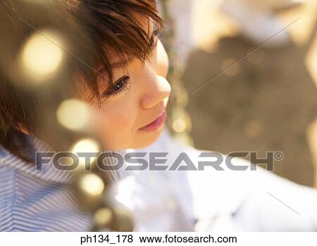Young woman on swing View Large Photo Image Stock Photo - Young woman on swing. Fotosearch