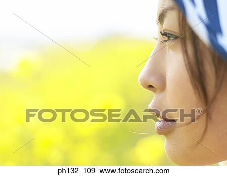 Young woman looking ahead View Large Photo Image Stock Photo - Young woman looking ahead. Fotosearch