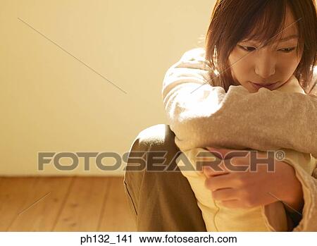Young woman in depressed mood View Large Photo Image Stock Image - Young woman in depressed mood. Fotosearch