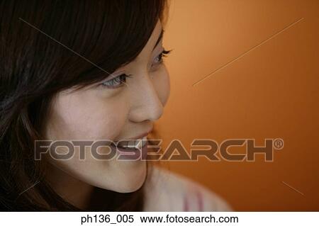 Young woman smiling View Large Photo Image Stock Photography - Young woman smiling. Fotosearch