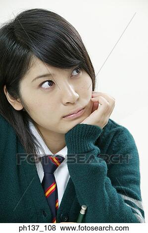 Teenage girl in class View Large Photo Image Stock Photo - Teenage girl in class. Fotosearch