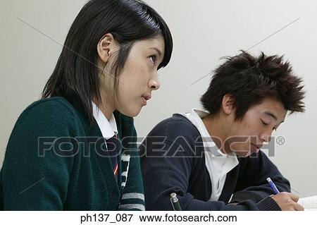 Teenagers in class View Large Photo Image Stock Photo - Teenagers in class. Fotosearch