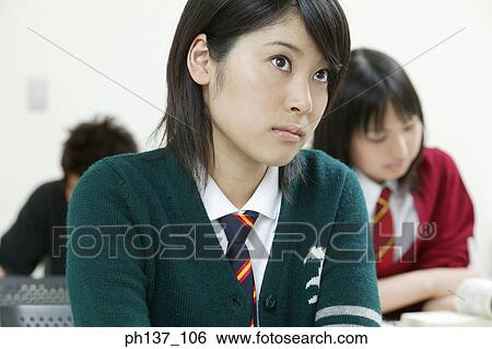 Stock Photograph - Teenagers in class. Fotosearch